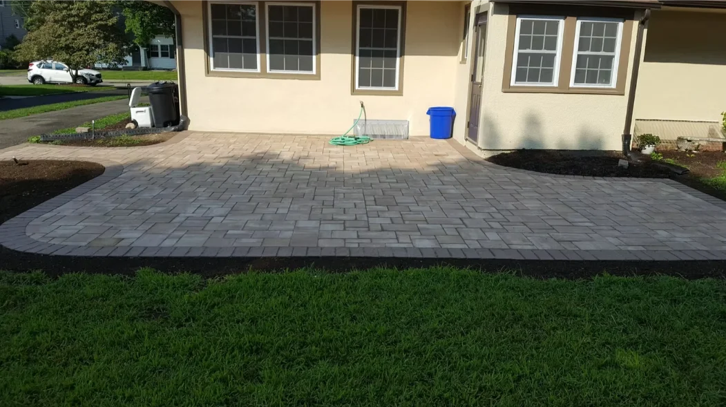 Freeform pool with travertine deck