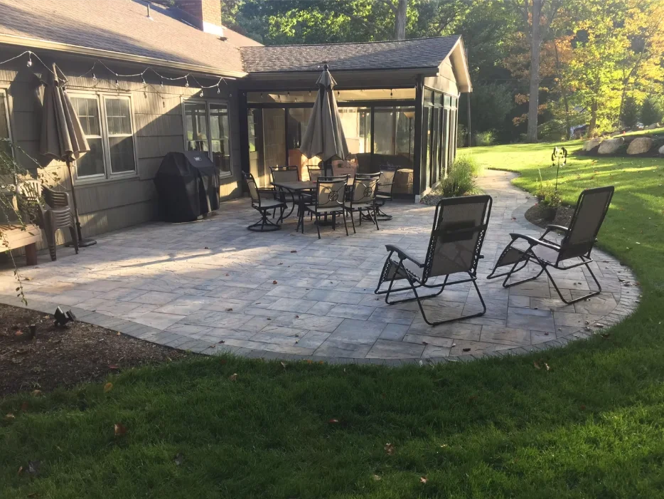 Infinity edge pool with natural stone coping